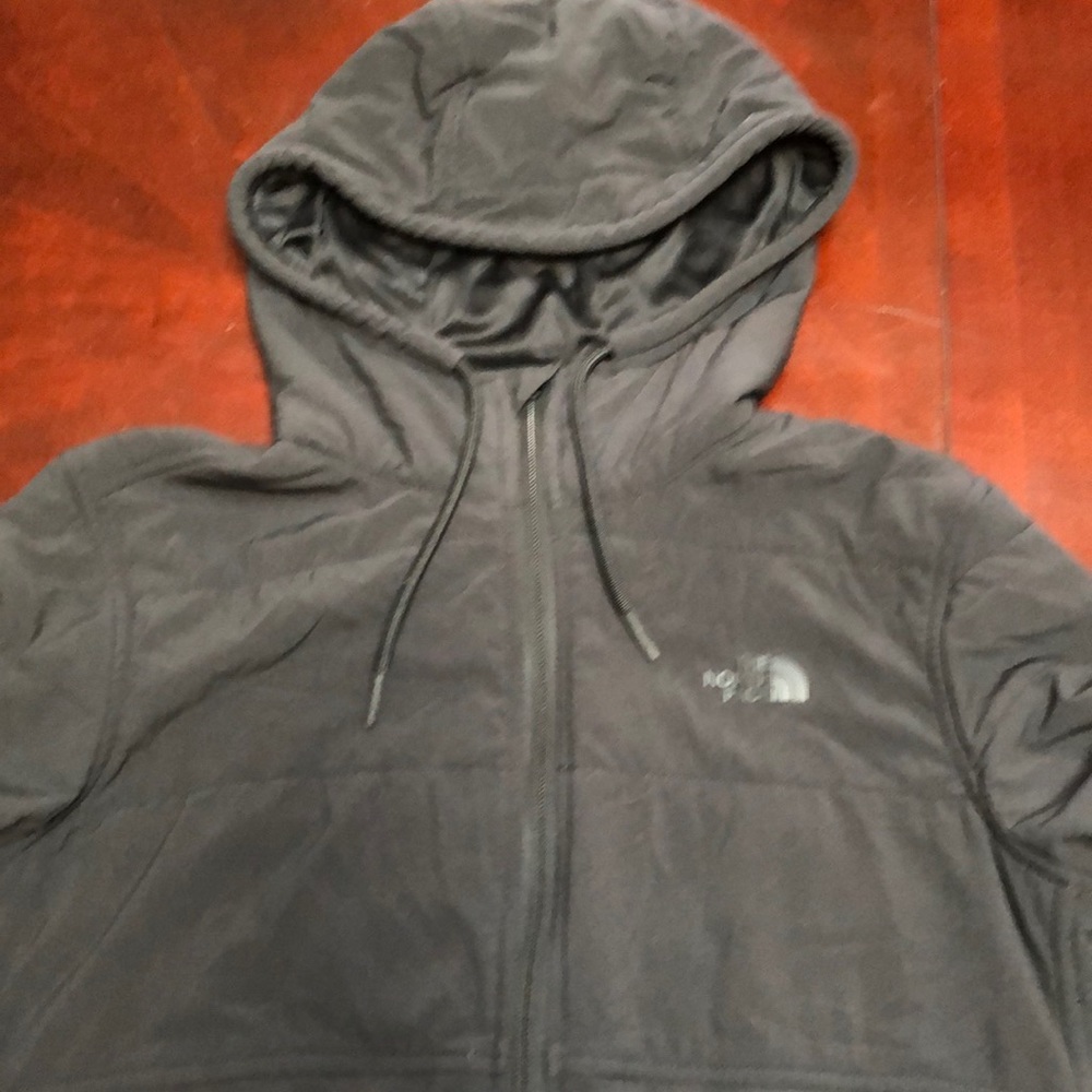 Super Soft Matte Black Women’s Patagonia Zippered Jacket.